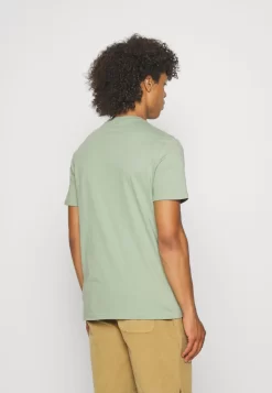 Pier One 3 Pack Unisex - Camiseta Básica - White/Offwhite /Green 12 Pier One 3 Pack Unisex - Camiseta Básica - White/Offwhite /Green -Pier One 894b2b7d440e4cc6940dba5e8d93d738 scaled