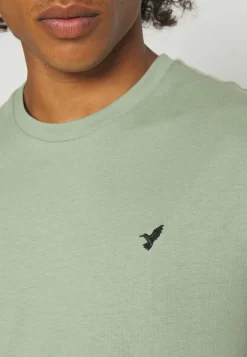 Pier One 3 Pack Unisex - Camiseta Básica - White/Offwhite /Green 19 Pier One 3 Pack Unisex - Camiseta Básica - White/Offwhite /Green -Pier One d23f111cb2e748f791d902cf155010fc scaled